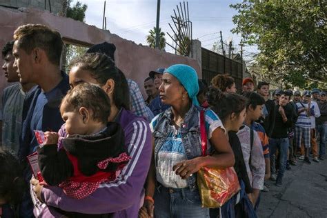 Migrant Caravan Is Just Yards From U S Border But Long Wait Lies