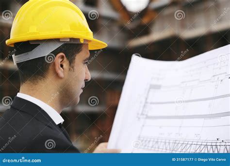 architect  construction site   building plans royalty  stock photography image