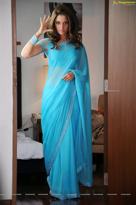 Only Actress Tamanna Front And Side View Hot In Blue Saree At Rebel Movie