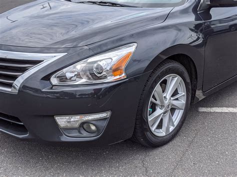 pre owned  nissan altima  sl fwd dr car