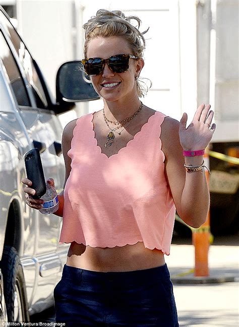 Britney Spears Flashes Toned Midriff In Cropped Tank Top And Shorts