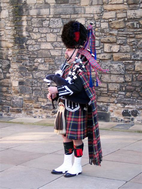 playing  bagpipes  poor guy  standing  pla flickr
