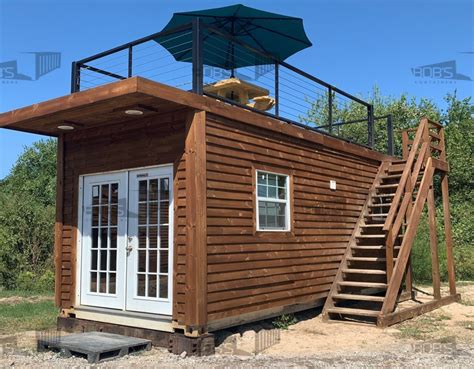 ft container home  dripping springs model shiplap  rooftop views   grid