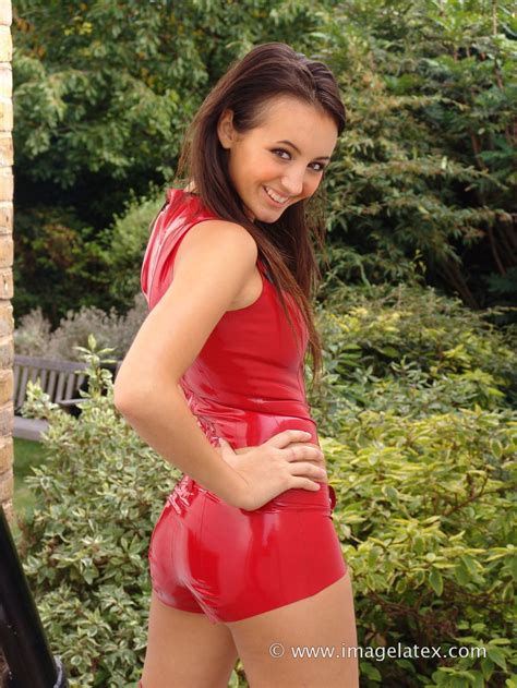 rachael wears a pair of red latex shorts
