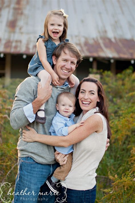 mom  dads arms crossed     front   arm holding baby great family