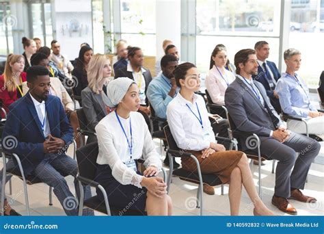 group  business people attending  business seminar stock photo