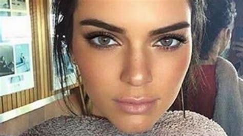 kendall jenner pulls a kylie with blue eyed look entertainment tonight