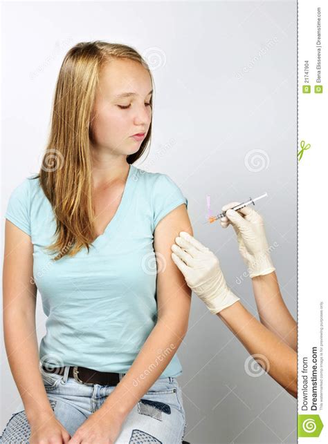 girl getting flu shot stock images image 21747904