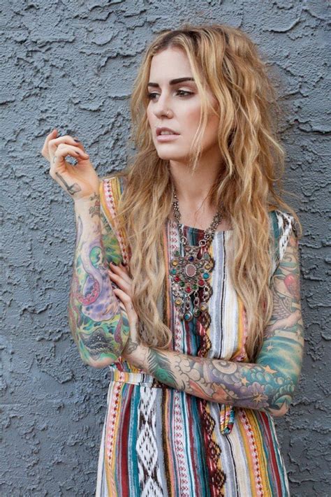 full sleeves tattooed blonde girl in a colorful dress fashion girls