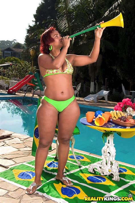 trashy brazilian lady exposing her huge puffy ass near the pool