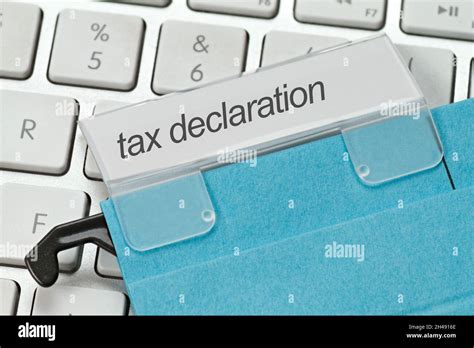blue hanging file  tax declaration stock photo alamy