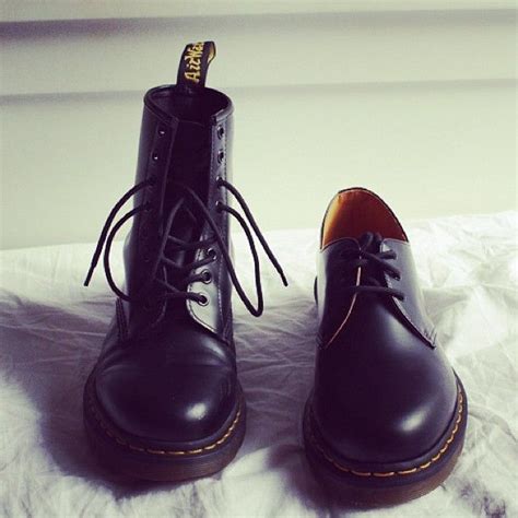 pair  high tops dr martens black shoes docs shoes kid shoes boots
