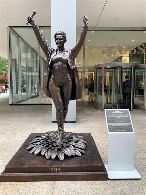 bronze sculptures  powerful women   view   midtown office building sqft