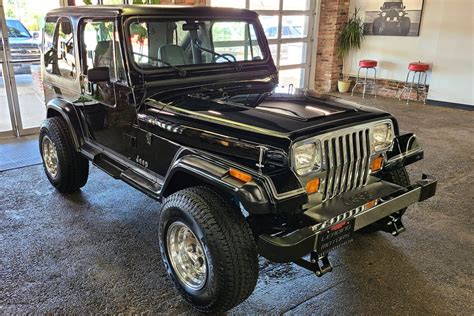 jeep wrangler laredo  speed  sale  bat auctions sold    september