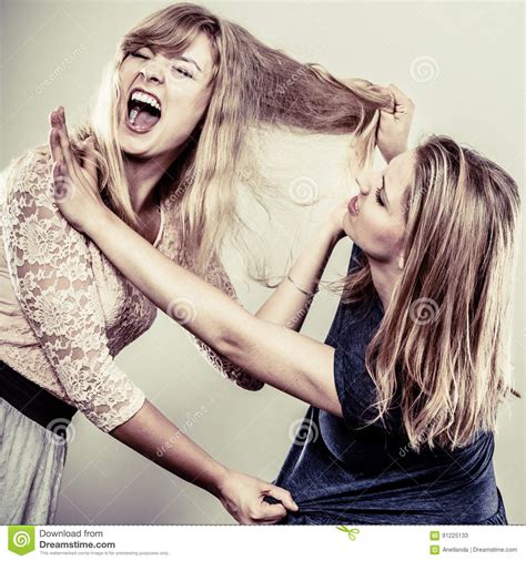 Aggressive Mad Women Fighting Each Other Stock Image
