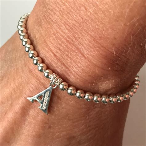 sterling silver letter charm stretch beaded bracelet uk handmade gift custom sizes gift boxed