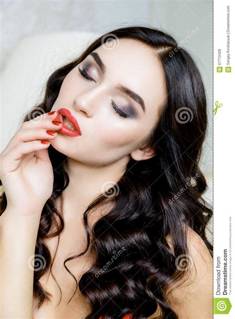 retro woman portrait red lips and nails closeup open