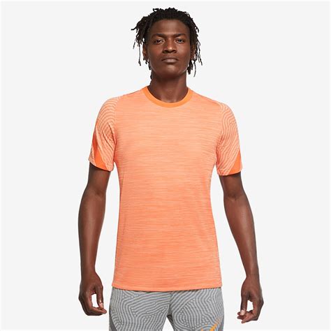 nike dry strike top melon tinttotal orange mens clothing tops