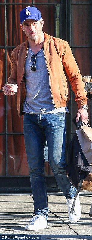 Chris Pine Flashes Smile While Donning Beige Coat T Shirt And Jeans