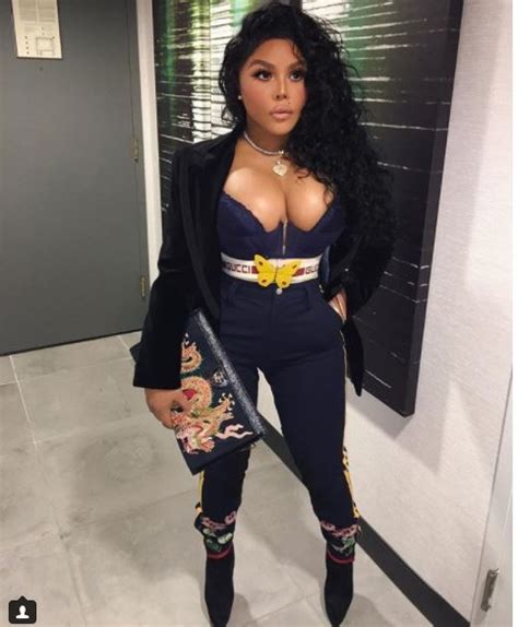 Photos Lil Kim Flashes Her Boobs In A Daring Corset Jumpsuit