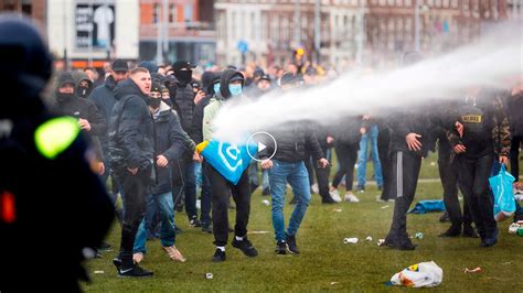 anti lockdown protesters clash with officers in the netherlands the