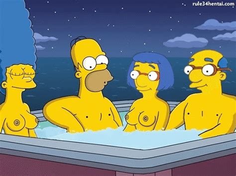 homer and marge simpson spending some quality time in the pool with another married duo…
