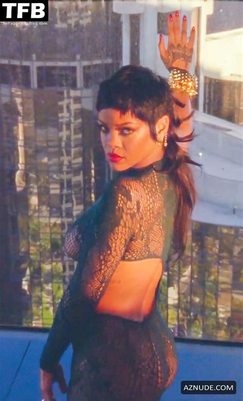 Rihanna Sexy Poses Braless And Shows Off Her Hot Curves In A Photoshoot