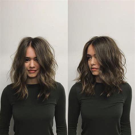 Brunette Layered Cut With Messy Wavy Texture And Center