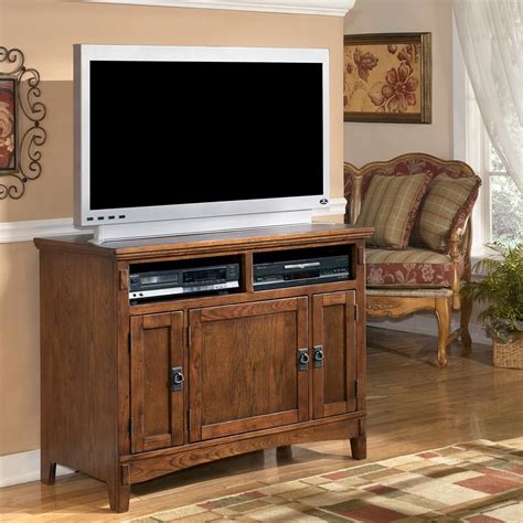 ashley furniture cross island   oak tv stand  mission style