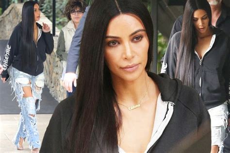 kim kardashian looks drained and in need of new jeans as she scales back sex factor mirror