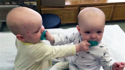 top funny twin babies fighting  pacifier reverse edition youtube