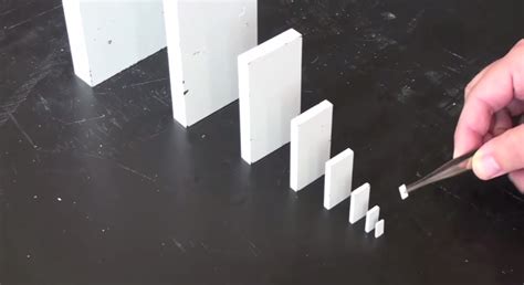 a domino the size of a tic tac could topple a building