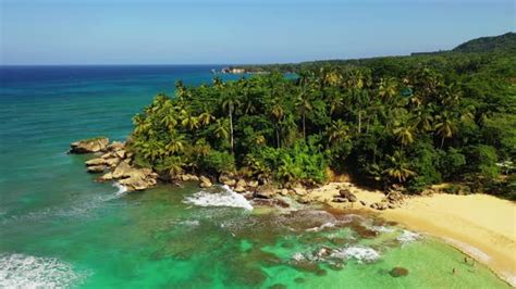 Aerial Forward Over Beach Of Nagua Dominican Republic Stock Footage