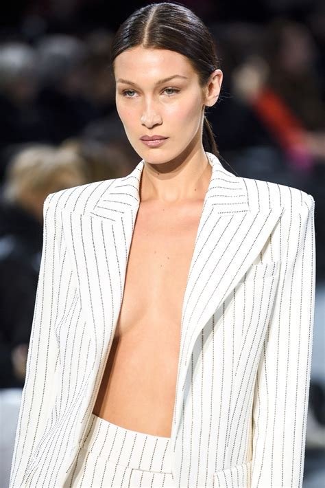 bella hadid sexy braless cleavage at the alexandre vauthier fashion