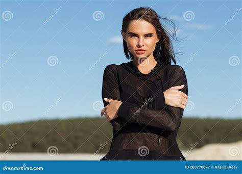 Alluring Brunette In Mesh Hoodie On Beach Stock Image Image Of