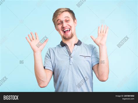 Excited Man Exclaimed In Happiness Gestures Actively