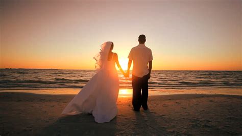 couple on the shore of the sea romantic couple at sunset