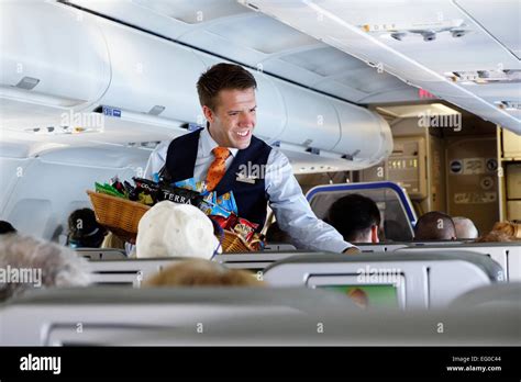 male flight attendant stock photo alamy