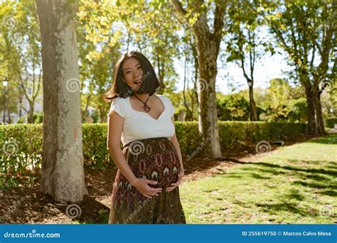Young Happy And Beautiful Asian Japanese Woman Posing Outdoors Happy