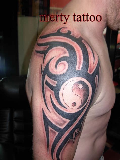 tribal  logo tattoo merty tattoo