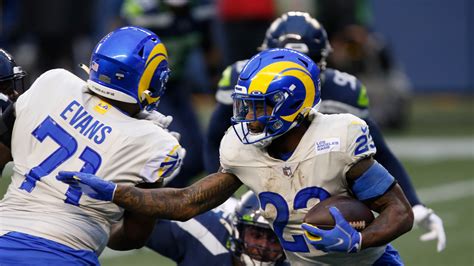 cam akers  historic playoff debut  rams win  seahawks