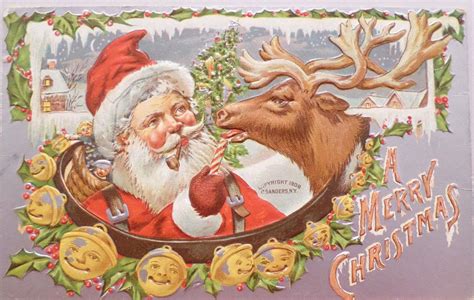 1908 christmas postcard santa claus feeding candy cane to reindeer unposted