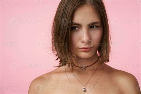 Pensive Young Attractive Short Haired Brunette Lady With Natural Makeup