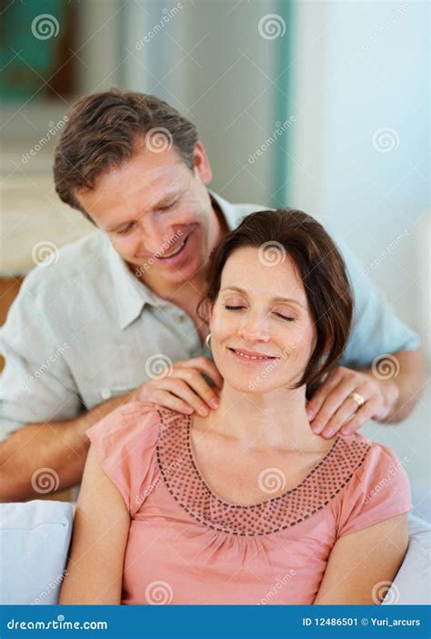 Woman Getting A Shoulder Massage From A Mature Man Stock Image Image