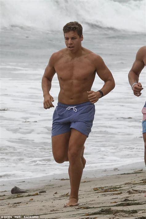 Arnold Schwarzenegger S Lookalike Son Is Buff On The Beach