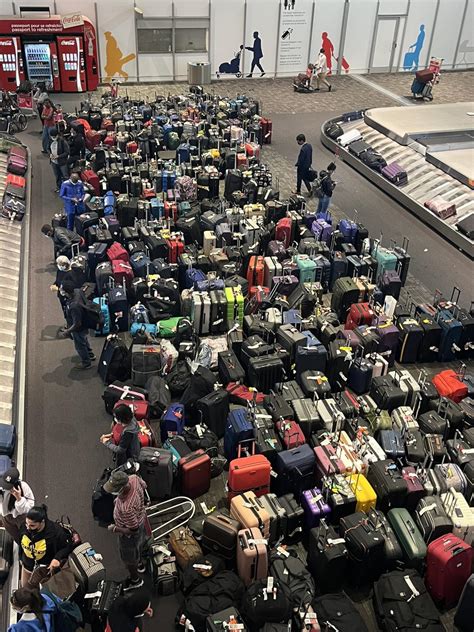 airport baggage issues    luggage  piling   canadas airports