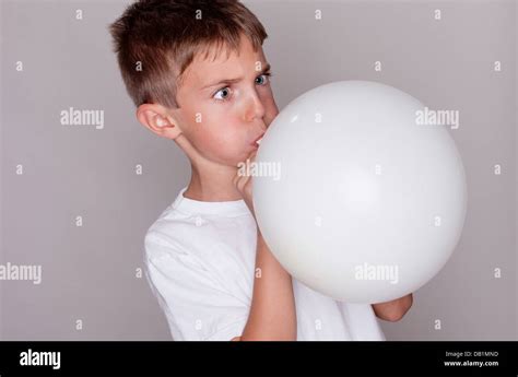 boy   blow   balloon  empty space  advertising stock