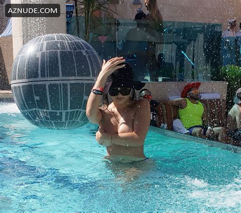 Tao Wickrath Topless While Partying At Strip Club Pool