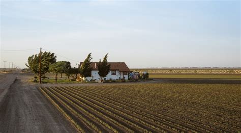 california farmers dig deeper for water sipping their neighbors dry