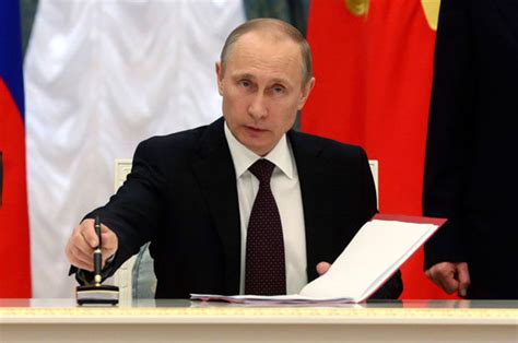 vladimir putin mocks eu sanctions threat as russia takes hold of crimea from ukraine daily star